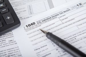 how to file out of state taxes investment property
